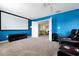 Home theater with large screen, comfortable seating and modern design at 1521 Flange Dr, Davenport, FL 33896