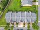 Overhead view of the neighborhood, emphasizing the tidy roofs and landscaped grounds at 15822 Woodland Spring Ct, Orlando, FL 32828
