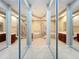 Bathroom showcasing dual sinks, a bathtub, and a separate shower stall, offering a luxurious experience at 15822 Woodland Spring Ct, Orlando, FL 32828