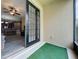 Screened porch offering a seamless transition to the indoor living and dining area through elegant French doors at 15822 Woodland Spring Ct, Orlando, FL 32828
