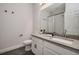 Bathroom featuring a single vanity with gray countertop, toilet and walk-in shower at 1624 Little Wren Ln, Winter Park, FL 32792