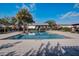 Sparkling community pool offering a refreshing retreat with ample lounge seating and shade at 1624 Little Wren Ln, Winter Park, FL 32792