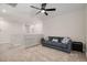 Upstairs living area featuring new carpet and ceiling fan at 1624 Little Wren Ln, Winter Park, FL 32792