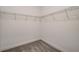 Walk-in closet with carpet and ample metal shelving for storage and organization at 1624 Little Wren Ln, Winter Park, FL 32792