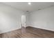 Spacious bedroom with hardwood floors and open doorway to walk-in closet at 17397 Sw 41St Cir, Ocala, FL 34473