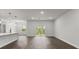 Bright living space featuring wood floors, recessed lighting, and an open layout with a sliding door to the backyard at 17397 Sw 41St Cir, Ocala, FL 34473
