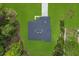 Aerial view of a single-Gathering home's dark gray roof with a spacious, green lawn at 17397 Sw 41St Cir, Ocala, FL 34473