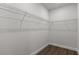 Empty walk-in closet with wire shelving and hardwood floors at 17397 Sw 41St Cir, Ocala, FL 34473