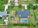 Aerial view of the house featuring a fenced backyard and a private swimming pool at 1778 Woodcrest Ln, Deland, FL 32720