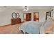 An expansive main bedroom features wooden trim, natural light, and access to the ensuite bathroom at 1778 Woodcrest Ln, Deland, FL 32720