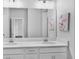 Bathroom features a double sink vanity and bright lighting at 1932 Terrapin Rd, Ocoee, FL 34761