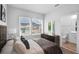 Well-lit bedroom boasting ample natural light and access to an ensuite bathroom at 1932 Terrapin Rd, Ocoee, FL 34761