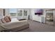 Bedroom showcasing soft bedding and a large mirror to create a relaxing atmosphere at 1932 Terrapin Rd, Ocoee, FL 34761