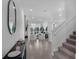 Bright living room featuring neutral walls, tile flooring, recessed lighting, and open floor plan at 1932 Terrapin Rd, Ocoee, FL 34761