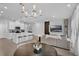 Open living space featuring a kitchen, dining area, and modern living room at 1932 Terrapin Rd, Ocoee, FL 34761