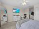 Spacious bedroom featuring a desk and television; perfect for study and relaxation at 2105 Lake Side Ave, Davenport, FL 33837