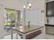 Cozy kitchen area with a view to an outdoor grill and dining area, perfect for Gathering gatherings at 2105 Lake Side Ave, Davenport, FL 33837