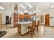 Spacious kitchen featuring a large island with seating, stainless steel appliances, and ample cabinet space at 2180 Captain Dr, Deltona, FL 32738