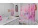' bathroom showcases unicorn-themed shower curtain and decorations at 2339 Jernigan Loop, Kissimmee, FL 34746