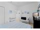 Bedroom with soft decor, a crib, and ample space at 2339 Jernigan Loop, Kissimmee, FL 34746
