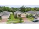 Charming single-story home with a brick driveway, well-maintained lawn, and inviting curb appeal at 2339 Jernigan Loop, Kissimmee, FL 34746