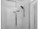 Elegant shower with glass door and marble-patterned tiles at 2339 Jernigan Loop, Kissimmee, FL 34746