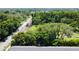 Aerial view showing lush green surroundings and the proximity to nature and roadways at 3118 Crown Jewel Ct, Winter Park, FL 32792