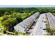 Aerial shot of townhomes highlighting manicured landscaping, and ample parking at 3118 Crown Jewel Ct, Winter Park, FL 32792