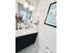 Bathroom vanity featuring granite counters, undermount sink, and decorative accents at 3118 Crown Jewel Ct, Winter Park, FL 32792