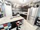 Well-equipped kitchen with granite countertops, stainless steel appliances, and ample cabinet space for storage at 3118 Crown Jewel Ct, Winter Park, FL 32792