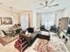 Open-concept living and dining area with modern furnishings, creating a stylish and functional space at 3118 Crown Jewel Ct, Winter Park, FL 32792