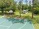 Community park featuring a basketball court, picnic benches and a covered shelter for outdoor activities at 3224 Holland Dr, Orlando, FL 32825