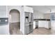 Beautiful kitchen with stainless steel appliances, white cabinetry, and granite countertops at 3224 Holland Dr, Orlando, FL 32825