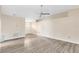 Spacious living room featuring modern flooring, neutral walls, and plenty of natural light at 3224 Holland Dr, Orlando, FL 32825