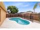 Private pool surrounded by a secure fence and lush landscaping offering a serene backyard retreat at 3224 Holland Dr, Orlando, FL 32825