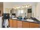 Bathroom showcasing dual sinks, ample counter space, and modern fixtures at 3250 Sawgrass Creek Cir, St Cloud, FL 34772