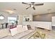 Cozy living space with comfortable seating area, stylish furniture, and modern decor, open to the dining area at 335 Lansbrook Ln, Winter Springs, FL 32708