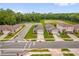 Aerial view of the neighborhood showcasing well-maintained lawns and community green spaces at 336 Pelham Park Dr, Deland, FL 32720
