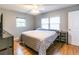 Bright bedroom with a large window, comfortable bed, and access to natural light for a relaxing ambiance at 3410 Calumet Dr, Orlando, FL 32810
