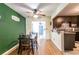 Cozy dining area adjacent to kitchen with view to a blue front door at 3410 Calumet Dr, Orlando, FL 32810