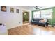 Bright living room featuring hardwood floors and neutral color palette with plenty of natural light at 3410 Calumet Dr, Orlando, FL 32810