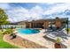 Backyard with a screened-in lanai with a heated pool and spa combo perfect for relaxation at 3562 Foxchase Dr, Clermont, FL 34711