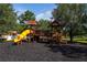 Community playground featuring a jungle gym with a slide at 3562 Foxchase Dr, Clermont, FL 34711