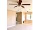 Spacious living room with neutral tones, ceiling fan, and a bright airy feel at 425 Walnut St, Daytona Beach, FL 32114