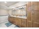 Bathroom featuring double vanity, and soaking tub at 4621 S Atlantic Ave # 7202, Port Orange, FL 32127