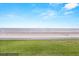 Enjoy beautiful ocean views and easy beach access from this property's expansive green lawn at 4621 S Atlantic Ave # 7202, Port Orange, FL 32127