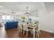 Dining area with mirrored wall and direct access to the ocean-view living room at 4621 S Atlantic Ave # 7202, Port Orange, FL 32127