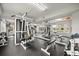 Community gym features modern weightlifting equipment and large mirror at 4621 S Atlantic Ave # 7202, Port Orange, FL 32127