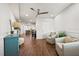 Inviting hallway featuring elegant decor, a glimpse of a modern kitchen, and a welcoming, open floor plan at 4621 S Atlantic Ave # 7202, Port Orange, FL 32127