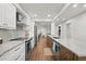 Spacious kitchen with a long island, stainless steel appliances, and seamless transition to the living area at 4621 S Atlantic Ave # 7202, Port Orange, FL 32127